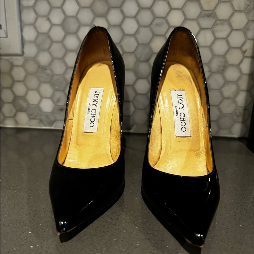 JIMMY CHOO
Black Anouk 120 Heels